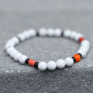 For Calming: White Howlite Beads with Orange and Black Accents